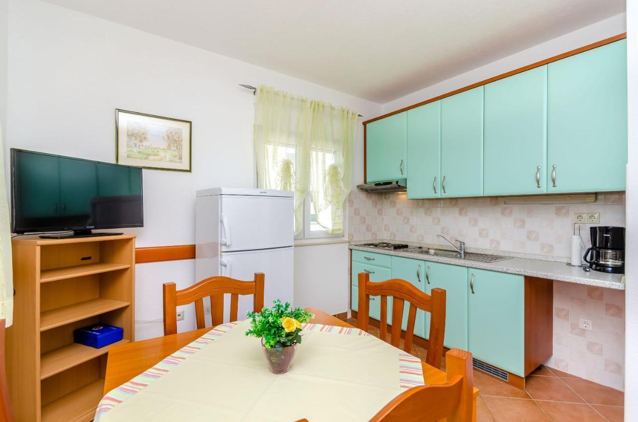 Apartments Palm Tree โตรกีร์ ภายนอก รูปภาพ