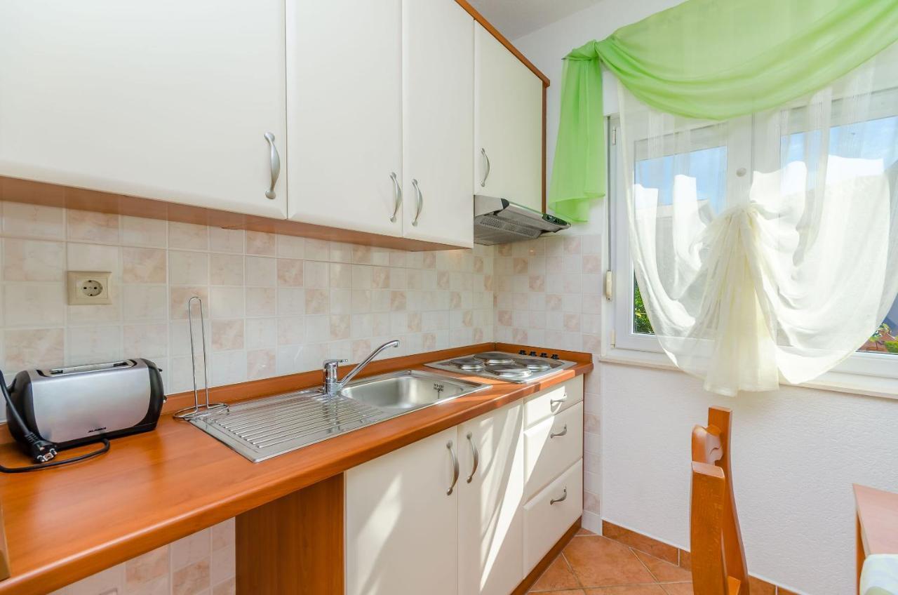 Apartments Palm Tree โตรกีร์ ภายนอก รูปภาพ